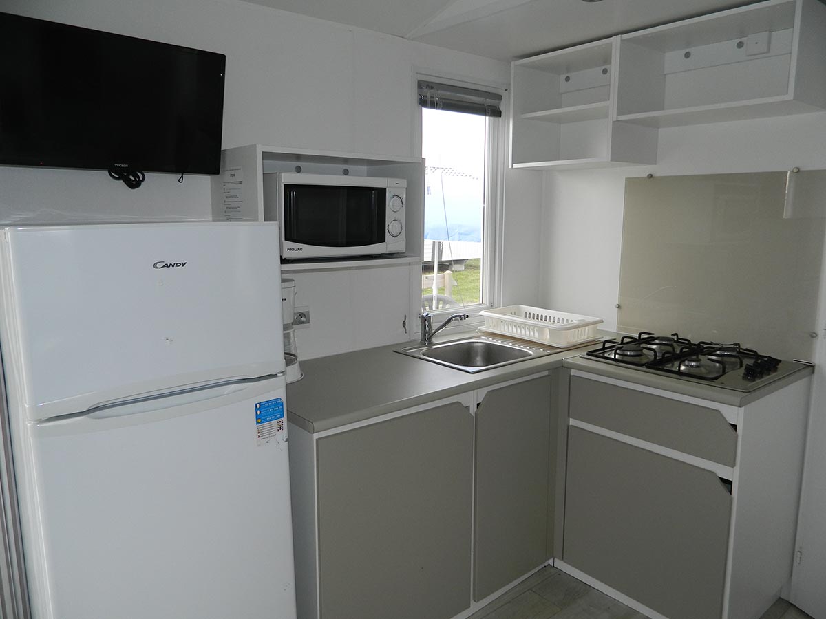 IRM super titania 3 chambres terrasse gamme standard camping omaha beach salon cuisine